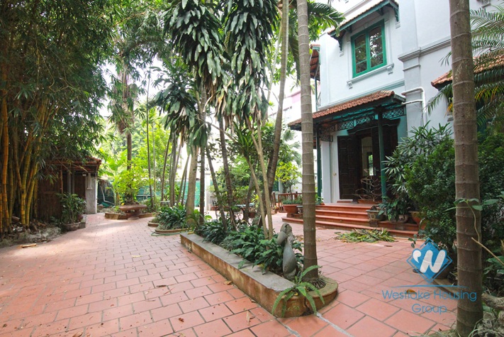Charming house for rent in Tay Ho with garden yard and swimming pool, available now
